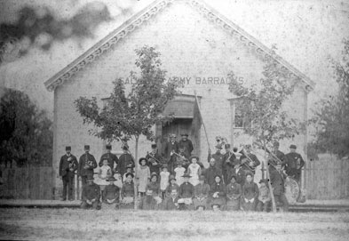 [ Salvation Army Barracks, Lucan, Robert Donnelly was repeatedly charged with harassing the Salvation Army in Glencoe, similar to the group shown here in Lucan., Unknown, University of Western Ontario Archives B5319, File 1 ]